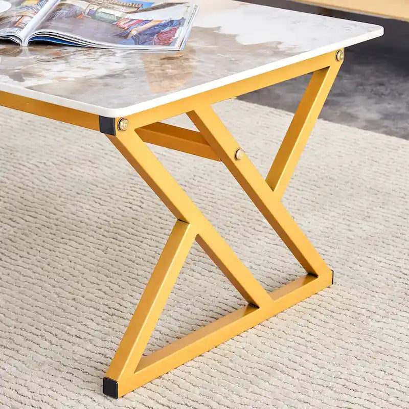 Table basse rectangulaire moderne en or / blanc+noir / noir / blanc+or avec plateau en pierre frittée et pieds en métal en forme de X – Unité unique