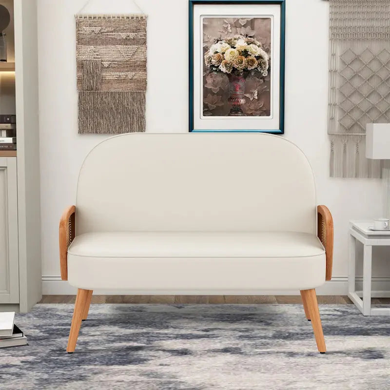 Causeuse en similicuir beige/vert/orange avec accoudoirs en rotin naturel et pieds en bois massif – 2 places