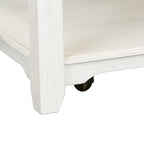 Table basse rectangulaire en bois d'hévéa et bouleau, avec roulettes, étagère inférieure et pieds fuselés – Finition blanc délavé et gris – Unité simple