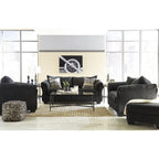 Fauteuil d'appoint contemporain noir en polyester avec structure évasée et accoudoirs rembourrés – Siège unique