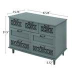 Armoire à 7 tiroirs vert foncé / bleu avec façades à panneaux sculptés, poignées en métal noir et pieds en bois massif – Unité simple